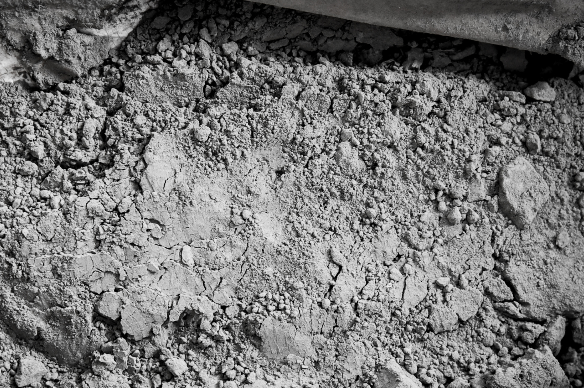 Grey powder compound for vibratory surface finishing, ensuring a consistent and high-quality finish on metal and non-metal parts.