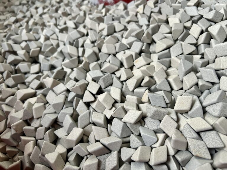 10mm ceramic triangular angle cut media for surface finishing, deburring, and polishing applications.