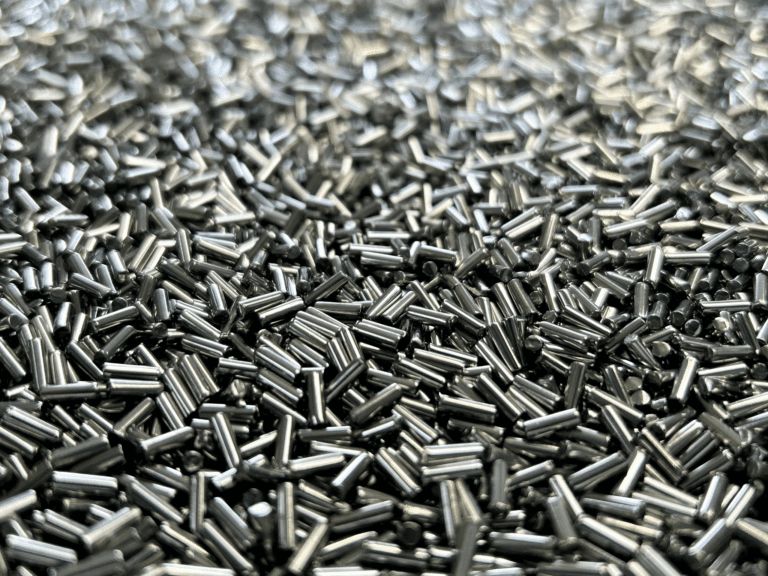 Stainless steel pins for polishing, suitable for burnishing, barrel finishing, and magnetic finishing processes.