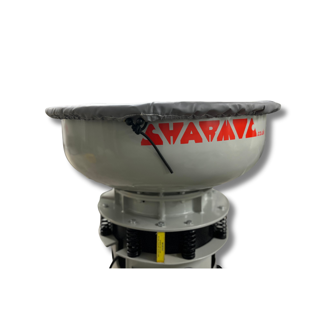 SM manual vibratory finishing machine fitted with splash stretch cover for protection during operation
