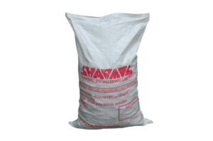 Sharmic-branded 25kg bag for vibratory finishing consumables or compounds, featuring a sturdy white sack with blue logo and product labeling, isolated on a transparent background.