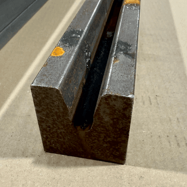 Image of rusty steel component before processing