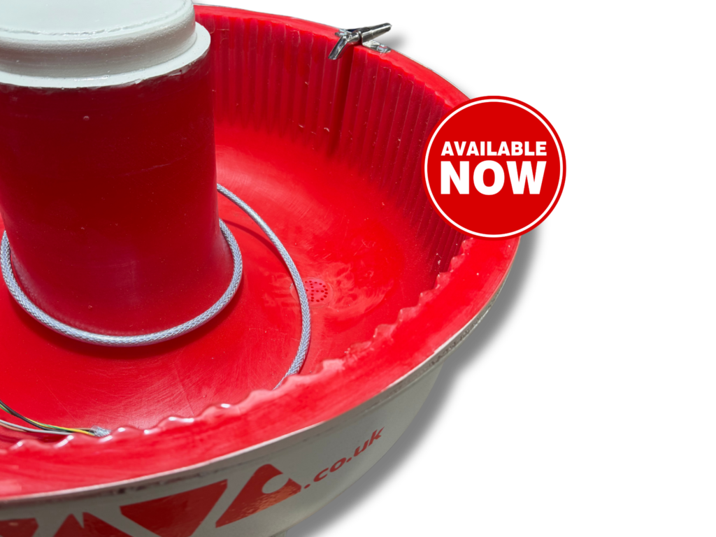 Close up of the new red polyurethane reline inside a refurbished FM3 90 litre vibratory finishing machine.