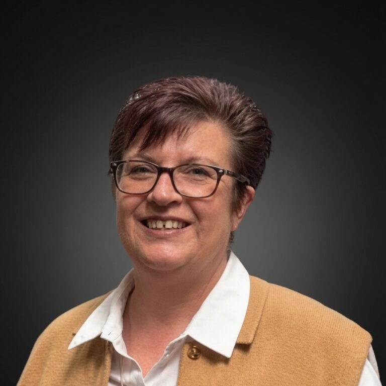 Sharon Edwards, General Manager at Sharmic, professional portrait for Meet the Team section